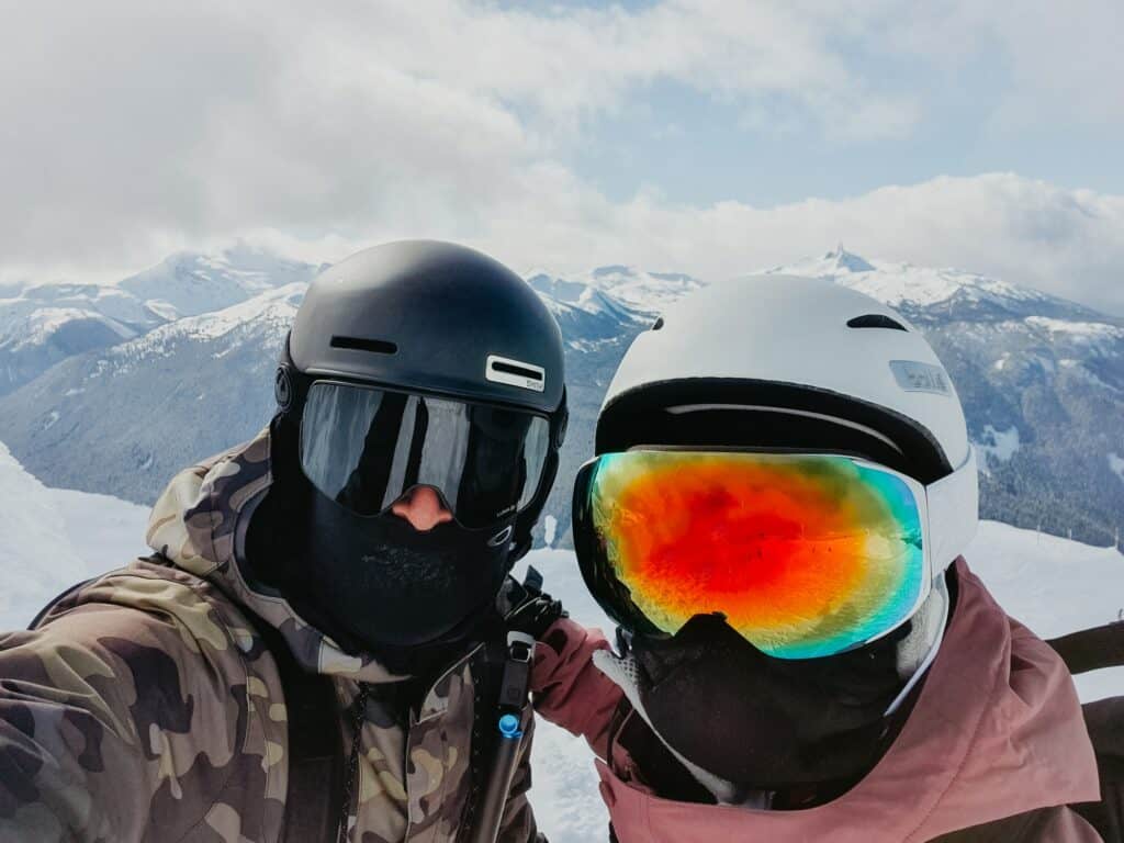 Selfie of the Couple in the mountain wearing ski googles